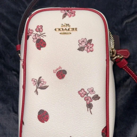 Coach Red and White Crossbody Bag with Adjustable Strap and Whimsical Design - Picture 4 of 5